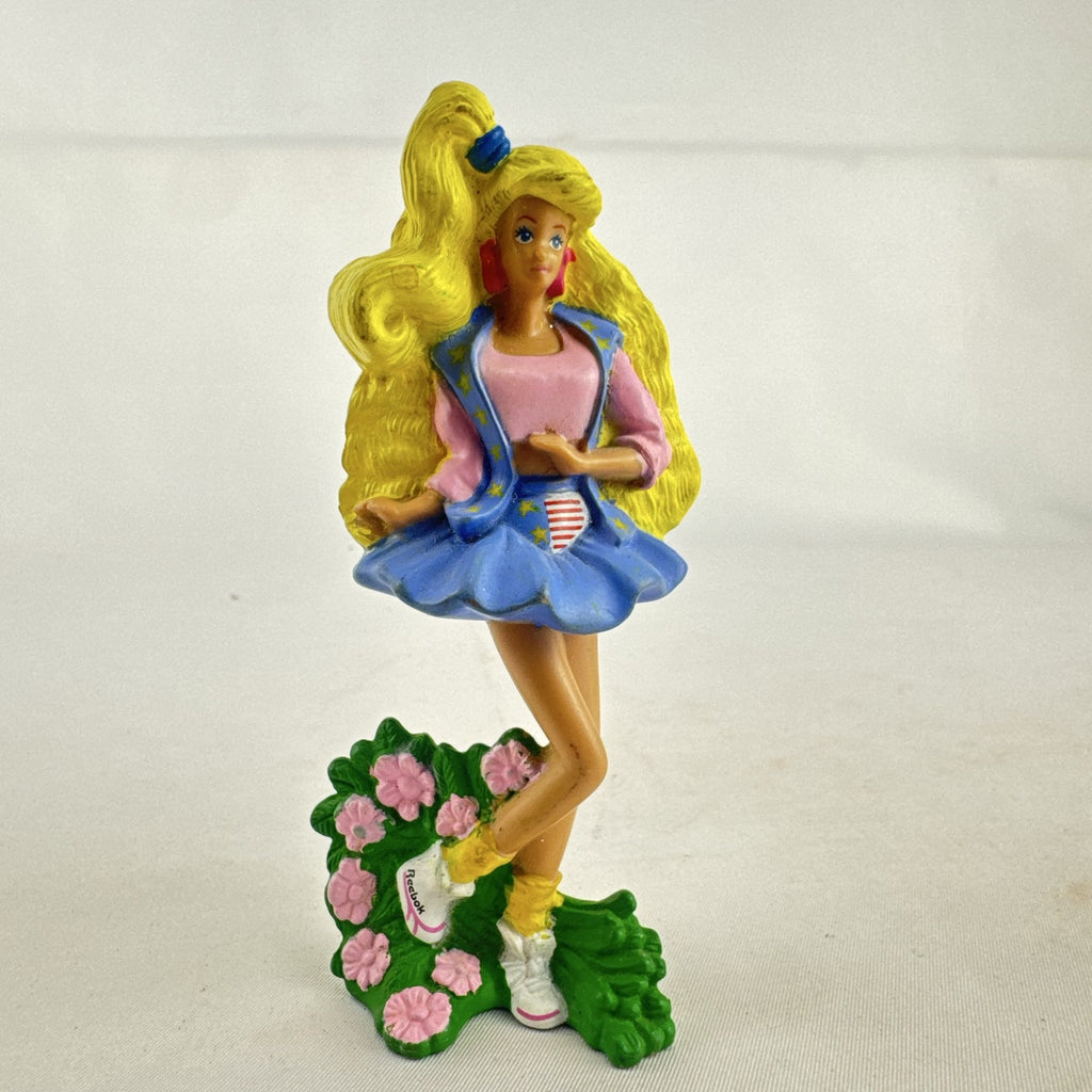 1991 Mattel All American Barbie McDonald's toy figure with pink crop top and Reebok sneakers