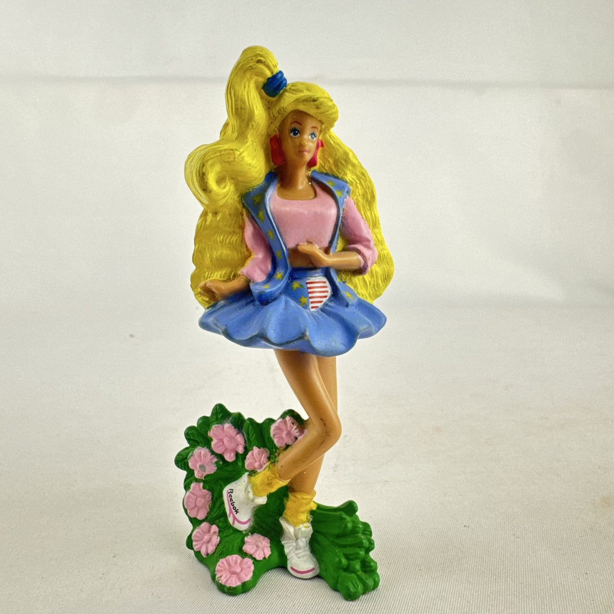 1991 Mattel All American Barbie McDonald's toy figure with pink crop top and Reebok sneakers