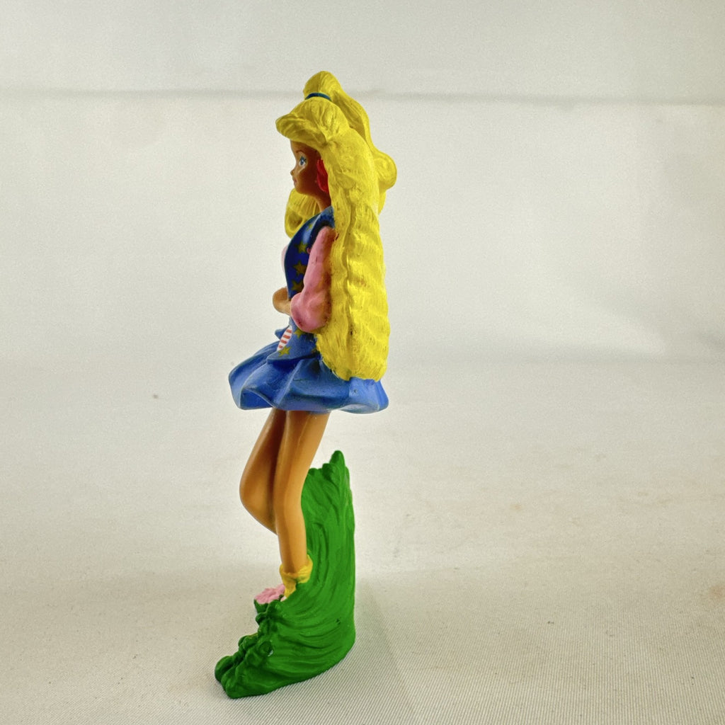 1991 Mattel All American Barbie McDonald's toy figure with pink crop top and Reebok sneakers