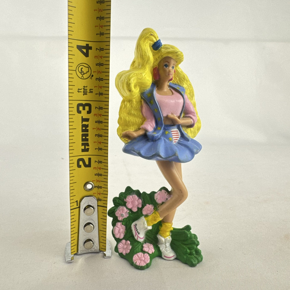 1991 Mattel All American Barbie McDonald's toy figure with pink crop top and Reebok sneakers