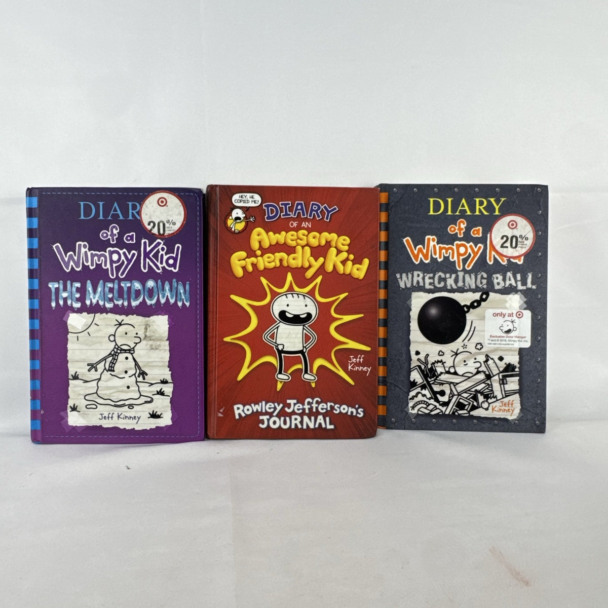 Set of three Jeff Kinney Diary of a Wimpy Kid hardcover books including The Meltdown and Wrecking Ball