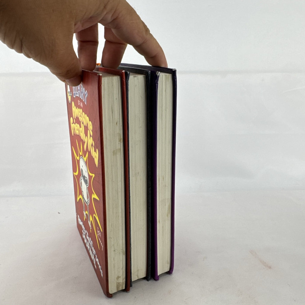 Set of three Jeff Kinney Diary of a Wimpy Kid hardcover books including The Meltdown and Wrecking Ball