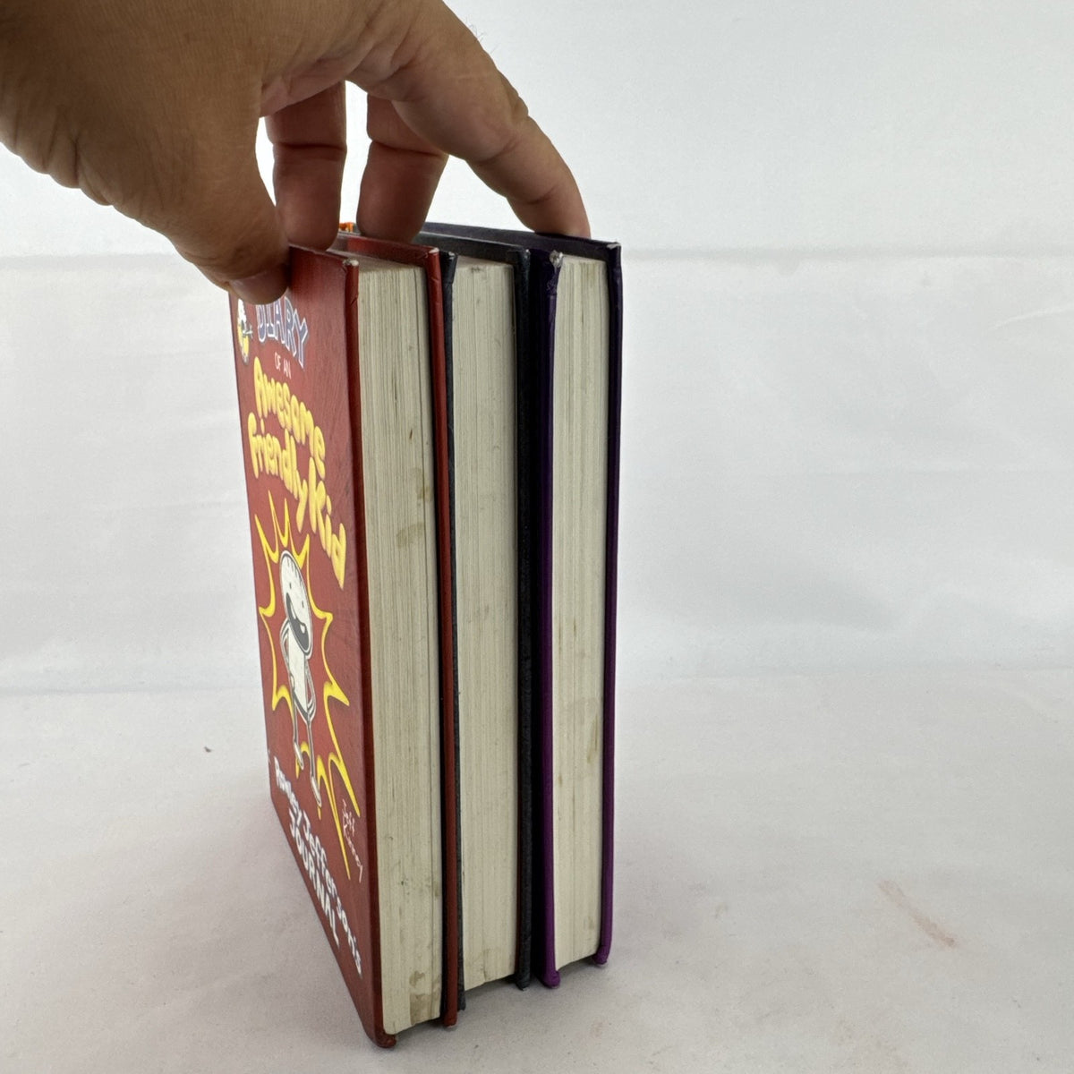 Set of three Jeff Kinney Diary of a Wimpy Kid hardcover books including The Meltdown and Wrecking Ball