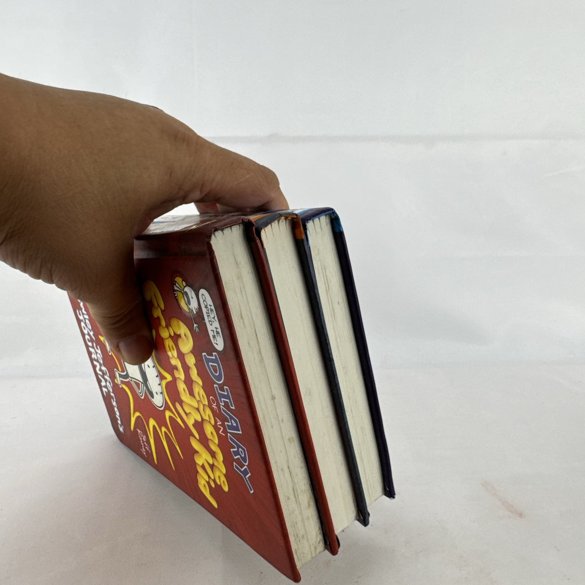 Set of three Jeff Kinney Diary of a Wimpy Kid hardcover books including The Meltdown and Wrecking Ball
