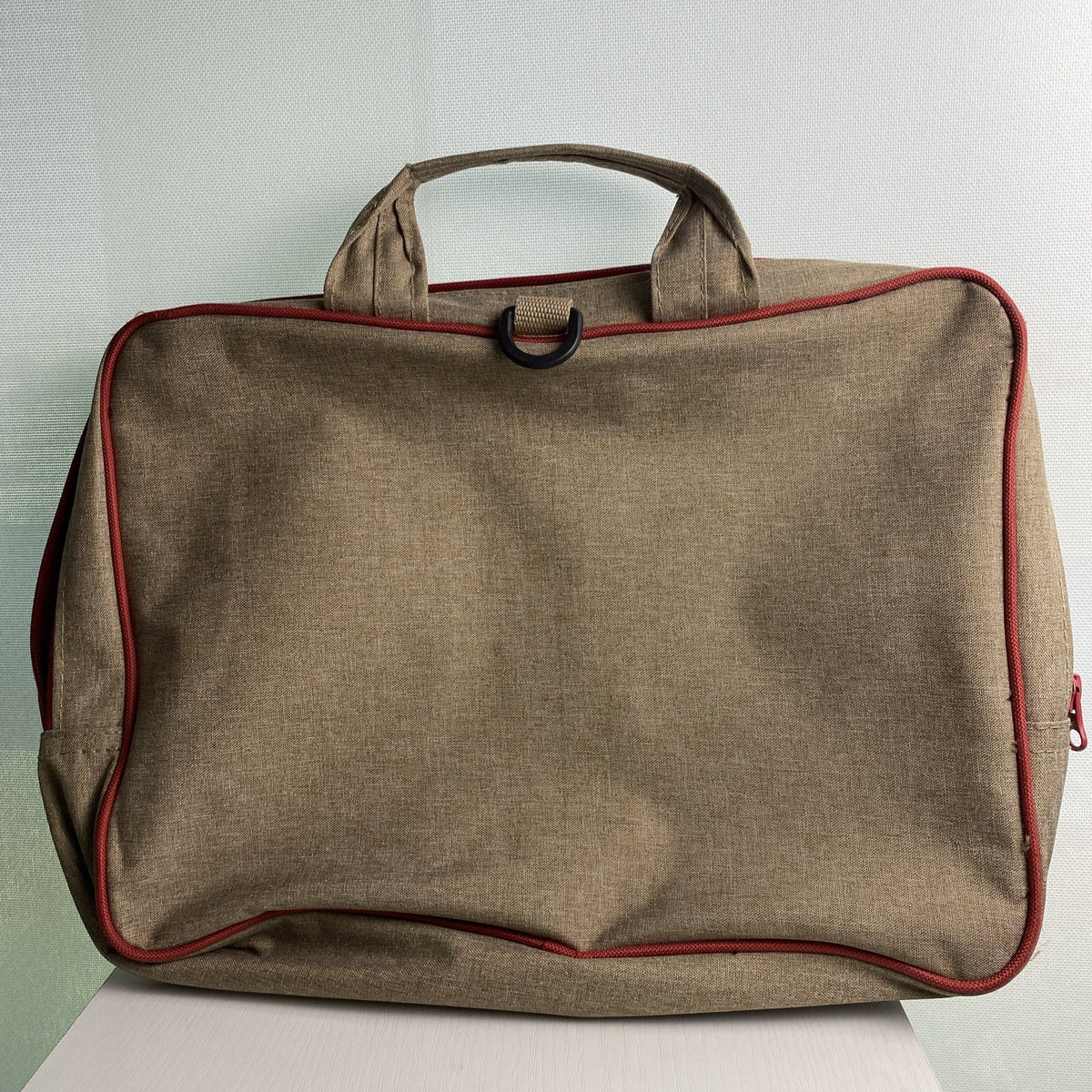 Kurgo pet travel gear organizer tote bag in heathered brown with red piping and dual handles