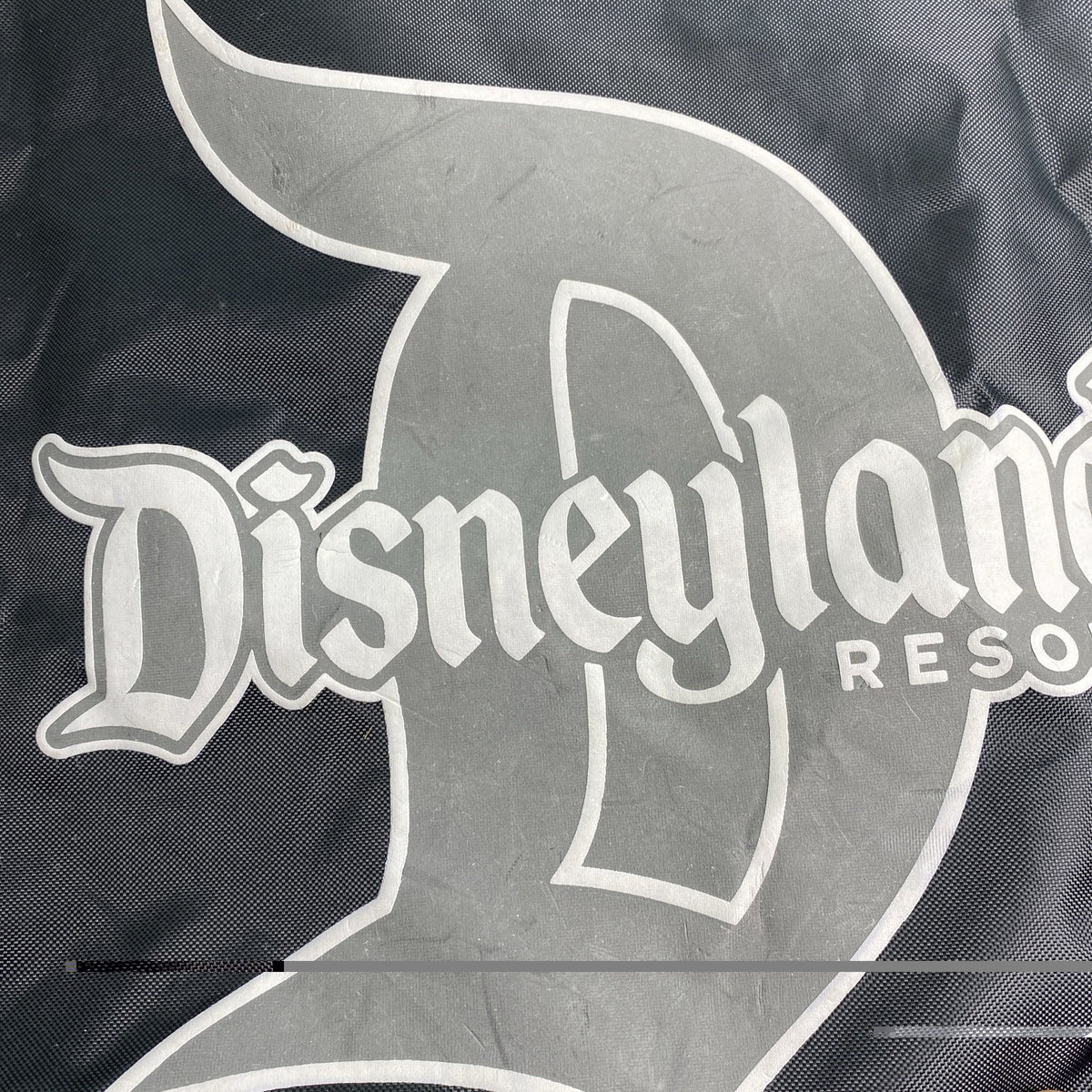 Disney Disneyland Resort 60th Diamond Celebration Annual Passholder black drawstring backpack with red piping