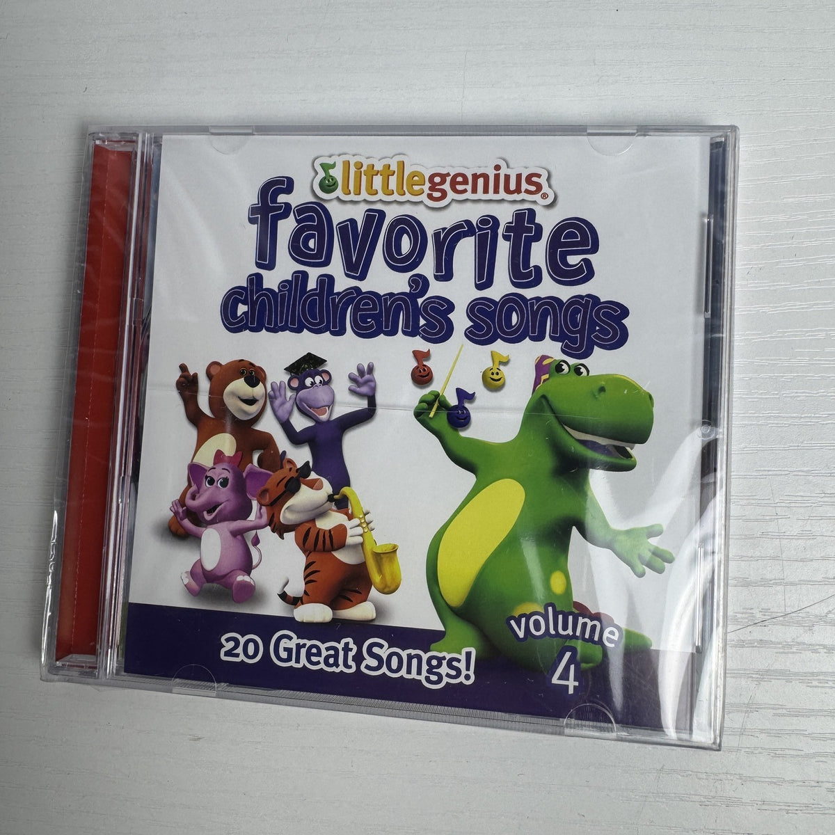 Set of 4 factory-sealed CDs including Salve Regina Gregorian Chant, Absolute Worship, and Little Genius children's songs.