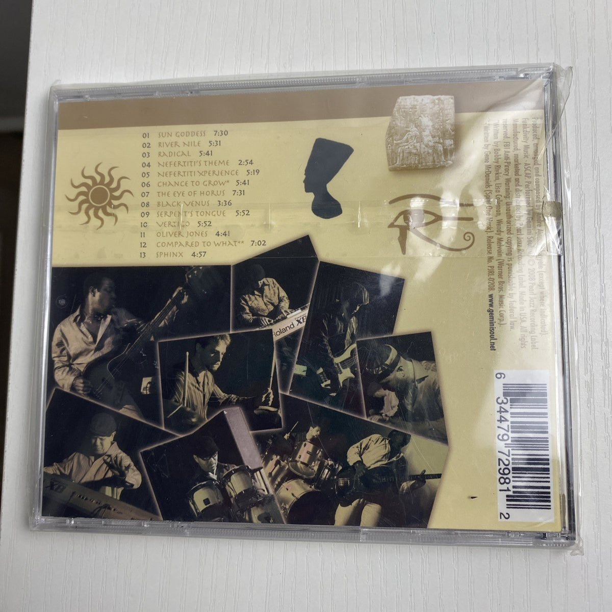 Set of four factory-sealed music CDs featuring classical, Latin pop, neo-soul, and sacred vocal albums.