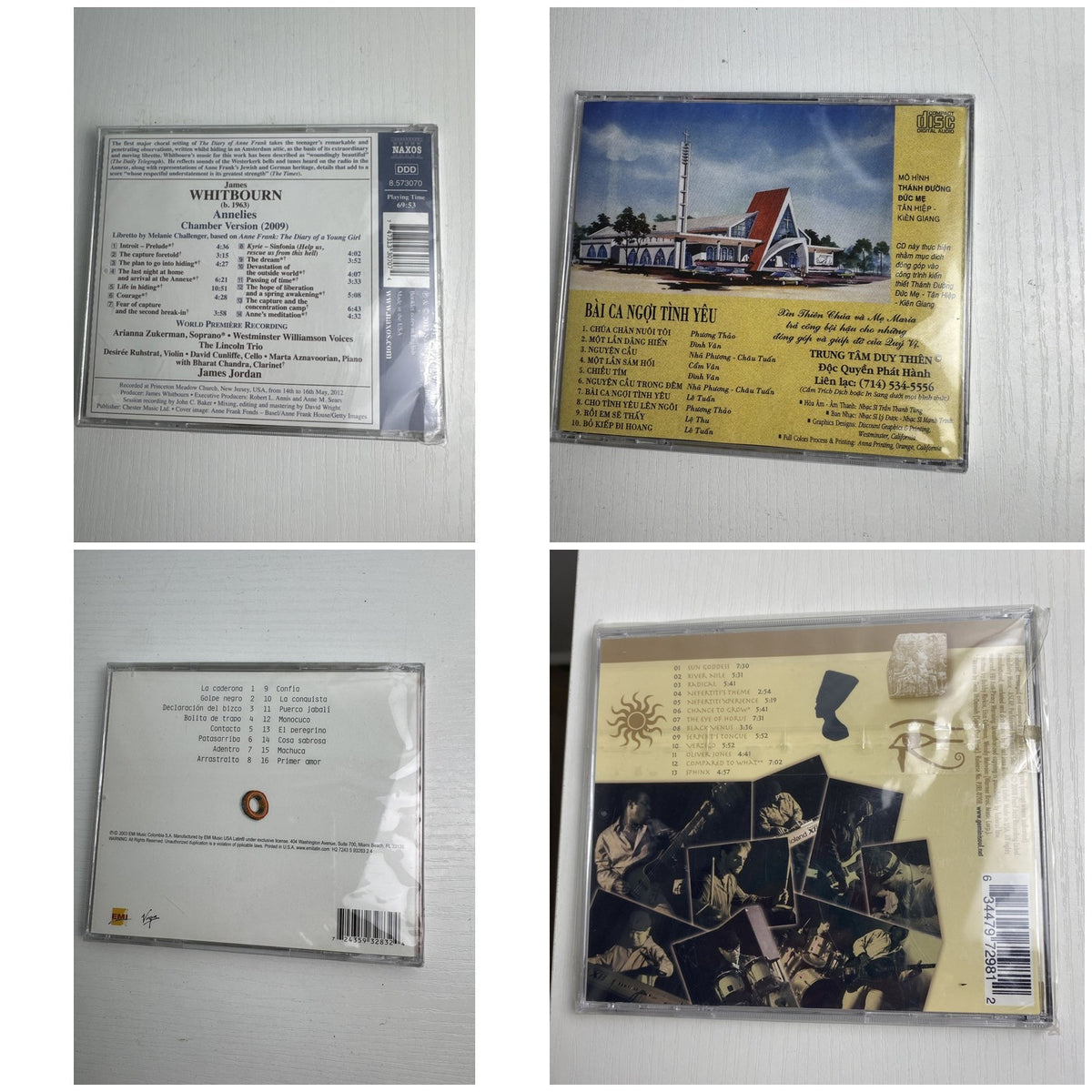 Set of four factory-sealed music CDs featuring classical, Latin pop, neo-soul, and sacred vocal albums.