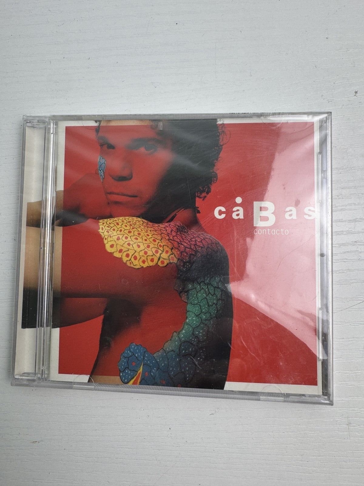 Set of four factory-sealed music CDs featuring classical, Latin pop, neo-soul, and sacred vocal albums.