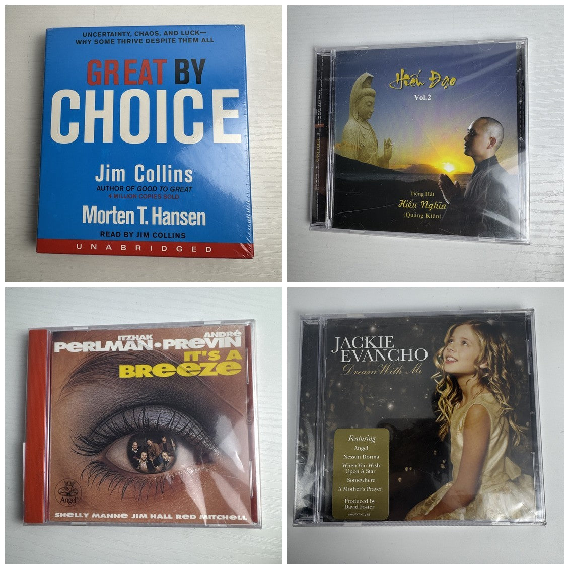 Set of four factory sealed CDs including Great By Choice audiobook, Jackie Evancho, and Itzhak Perlman albums.