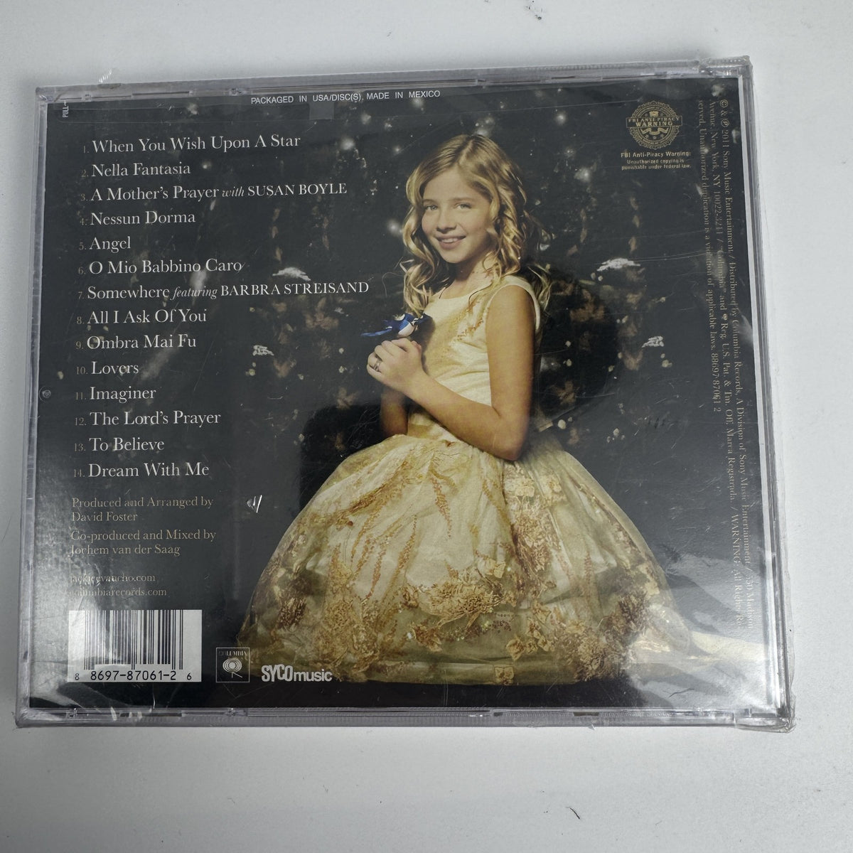 Set of four factory sealed CDs including Great By Choice audiobook, Jackie Evancho, and Itzhak Perlman albums.