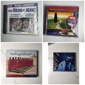 Assorted lot of 4 brand new factory-sealed music CDs including Sound of Music London Cast and 90s Sony Rock Sampler