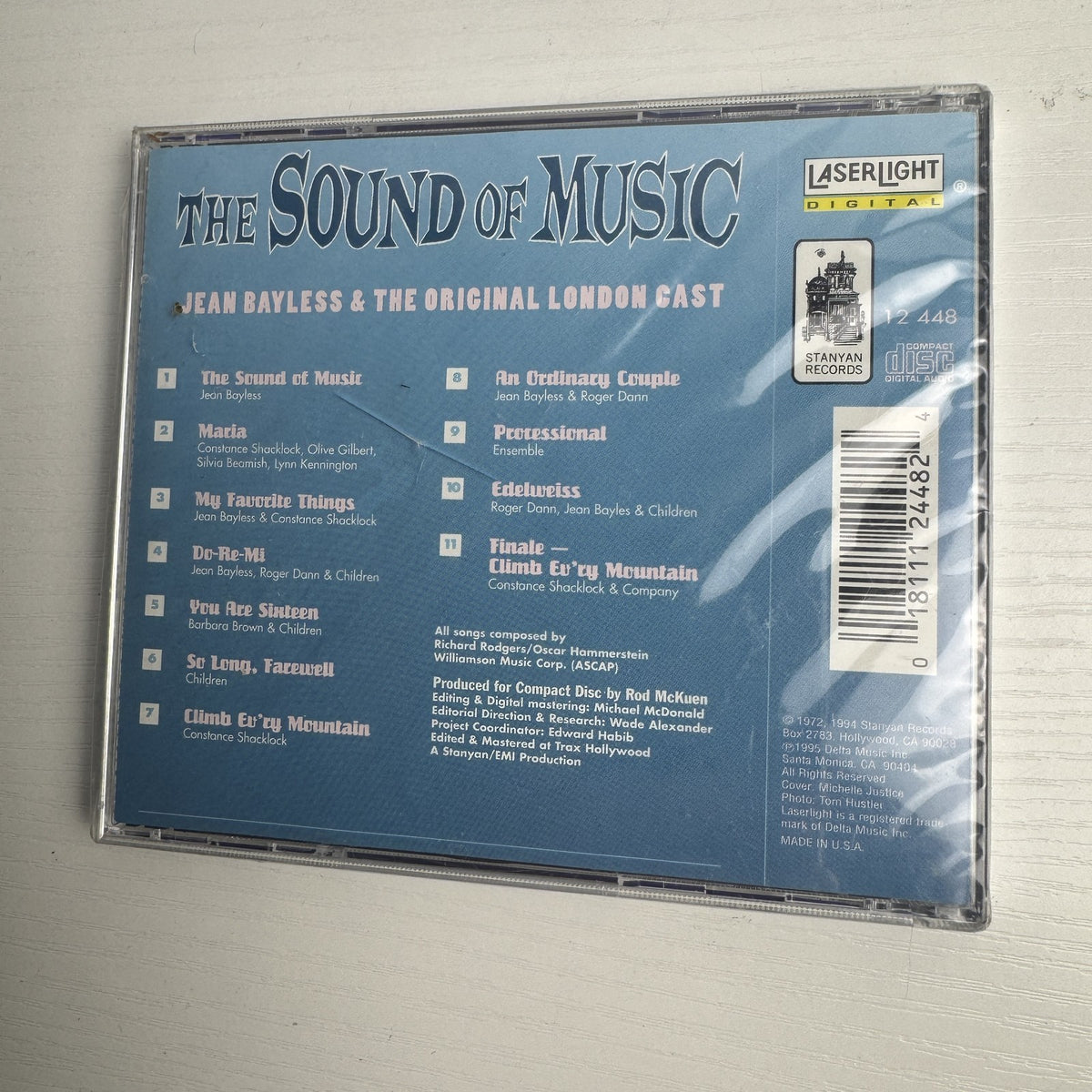 Assorted lot of 4 brand new factory-sealed music CDs including Sound of Music London Cast and 90s Sony Rock Sampler