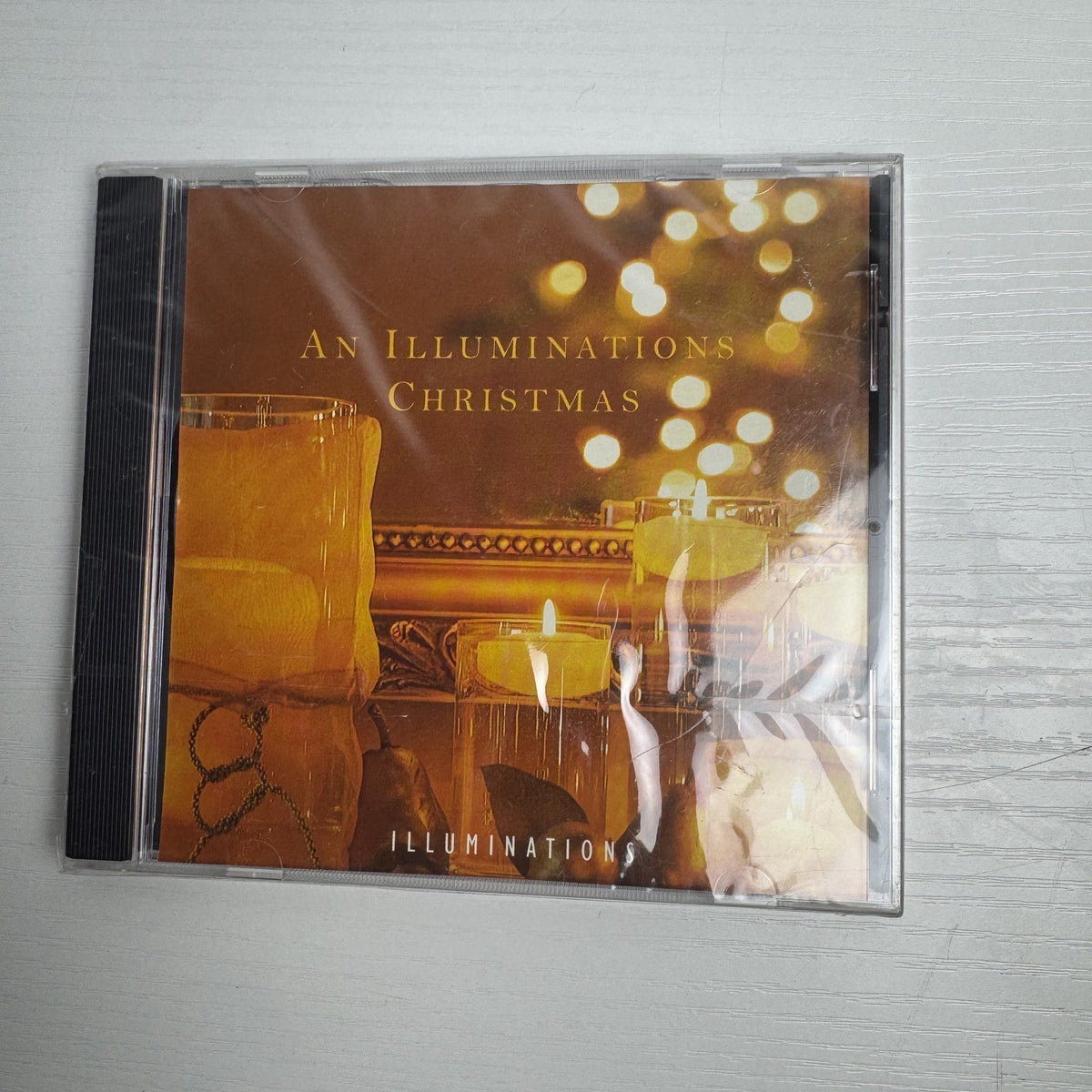 Lot of 4 factory sealed Christmas music CDs including Latin, acoustic, and classical holiday albums.