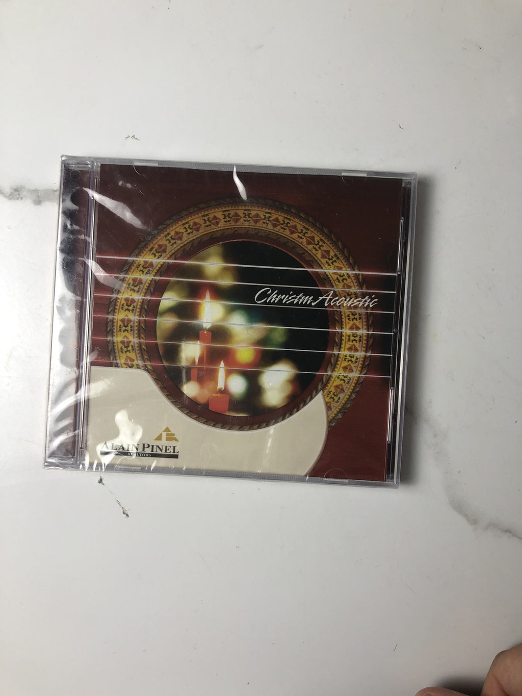 Lot of 4 factory sealed Christmas music CDs including Latin, acoustic, and classical holiday albums.