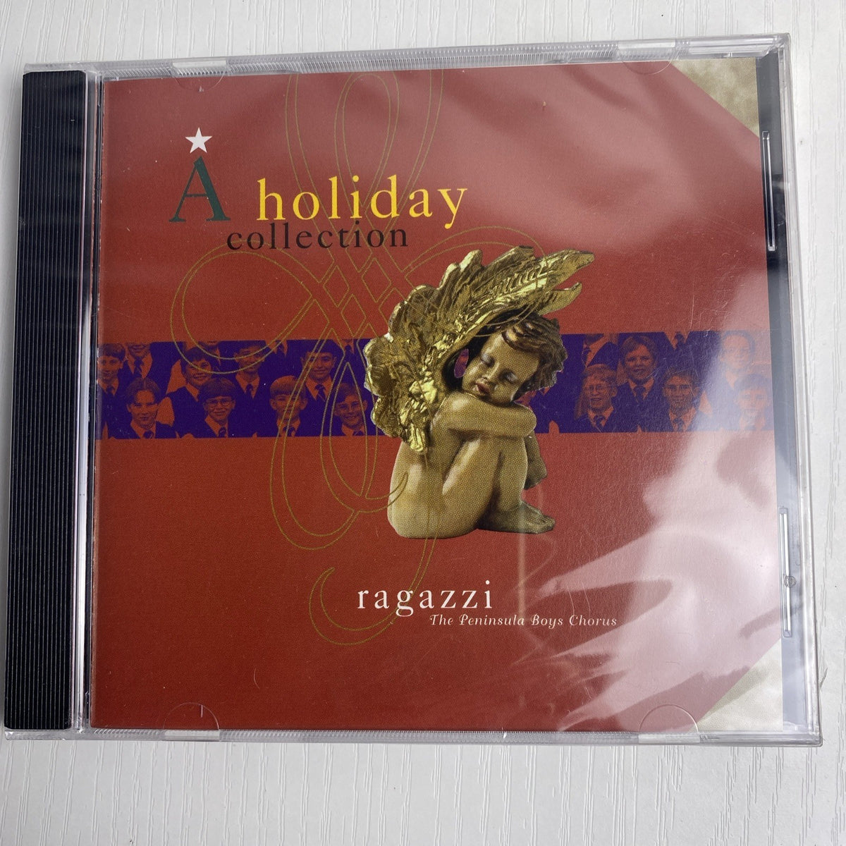 Set of 4 brand new factory-sealed holiday CDs including Windham Hill Winter Solstice IV and classical music compilations.