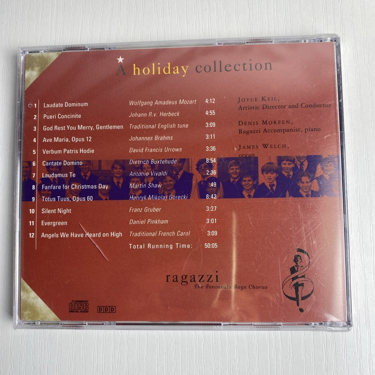 Set of 4 brand new factory-sealed holiday CDs including Windham Hill Winter Solstice IV and classical music compilations.
