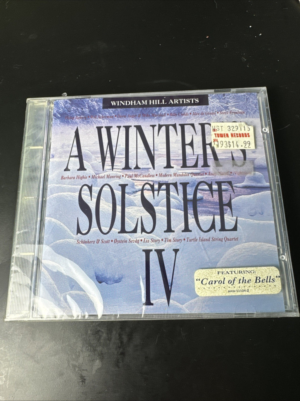 Set of 4 brand new factory-sealed holiday CDs including Windham Hill Winter Solstice IV and classical music compilations.