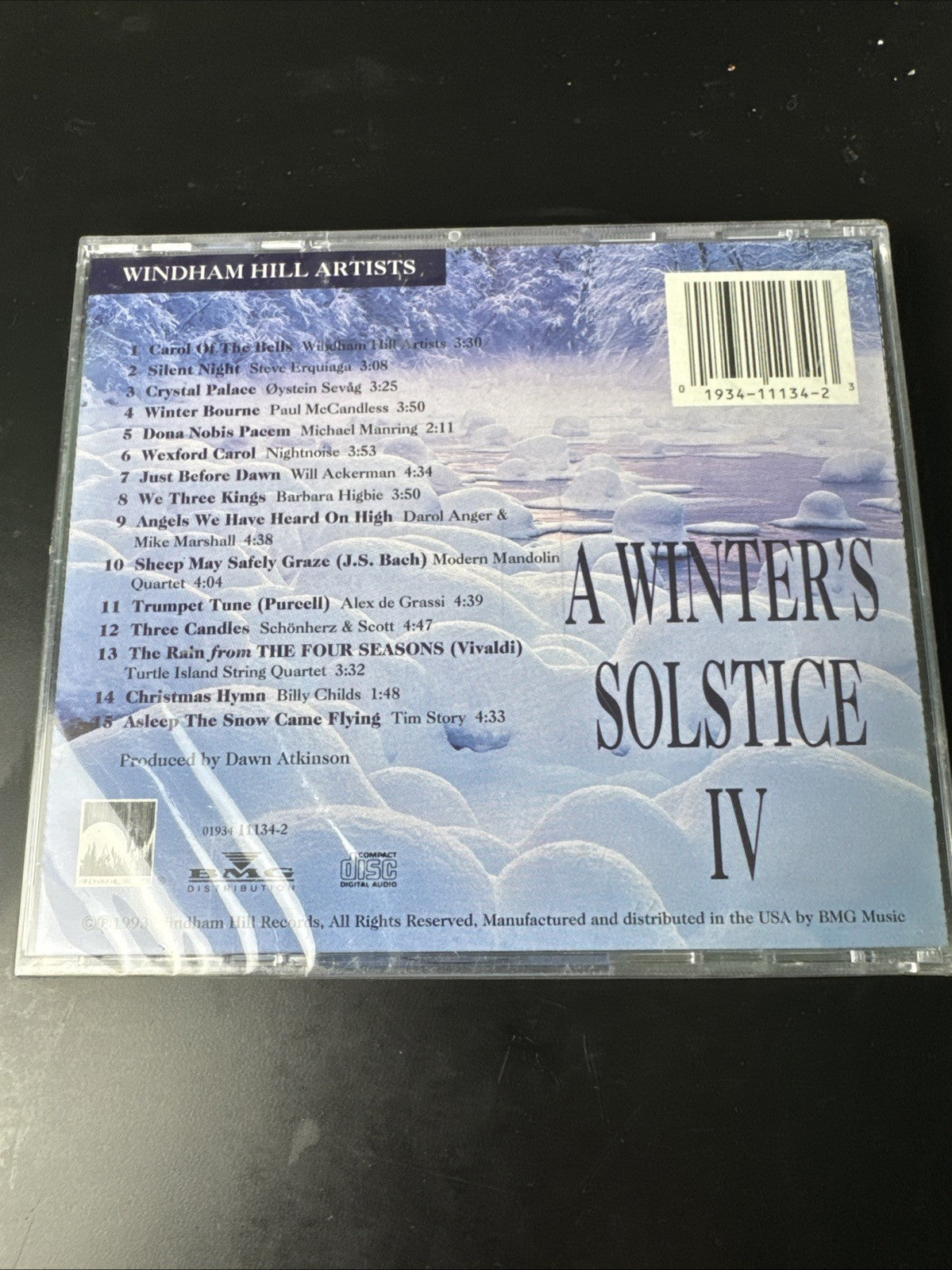 Set of 4 brand new factory-sealed holiday CDs including Windham Hill Winter Solstice IV and classical music compilations.