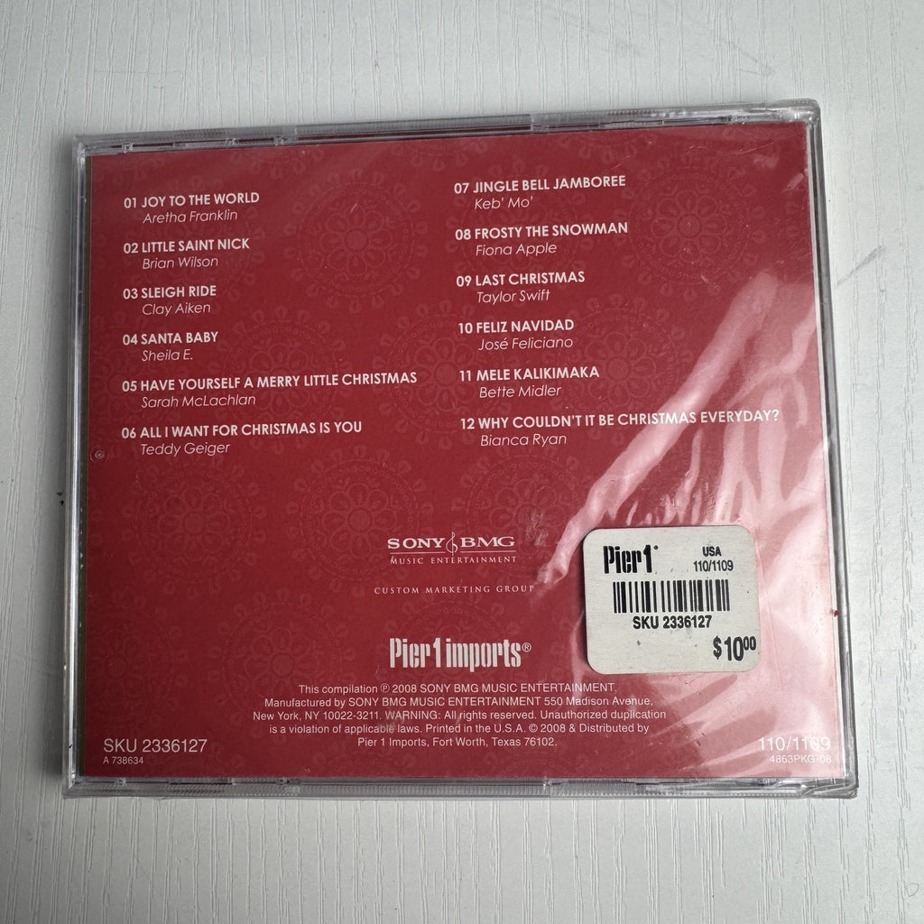 Set of 4 brand new factory-sealed holiday CDs including Windham Hill Winter Solstice IV and classical music compilations.