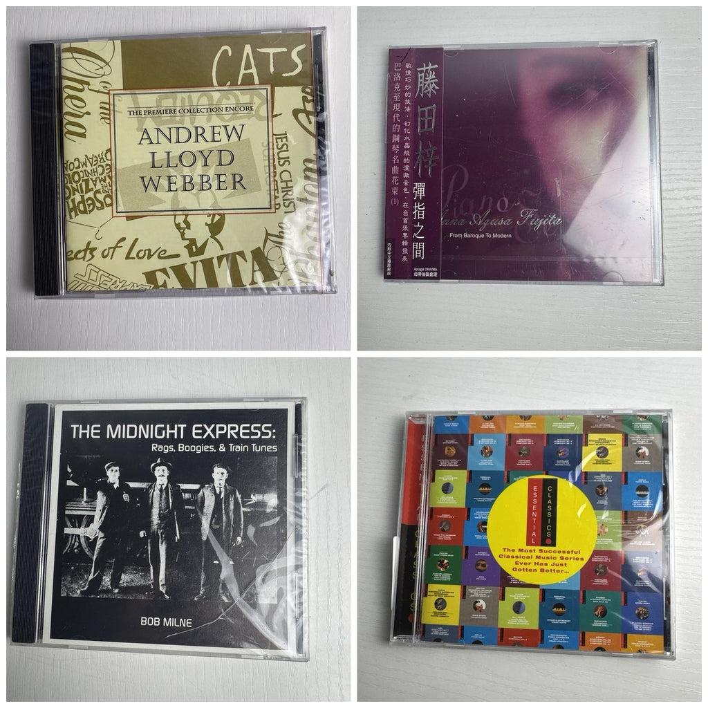 Set of 4 factory-sealed classical and piano music CDs including Andrew Lloyd Webber and Bob Milne albums.