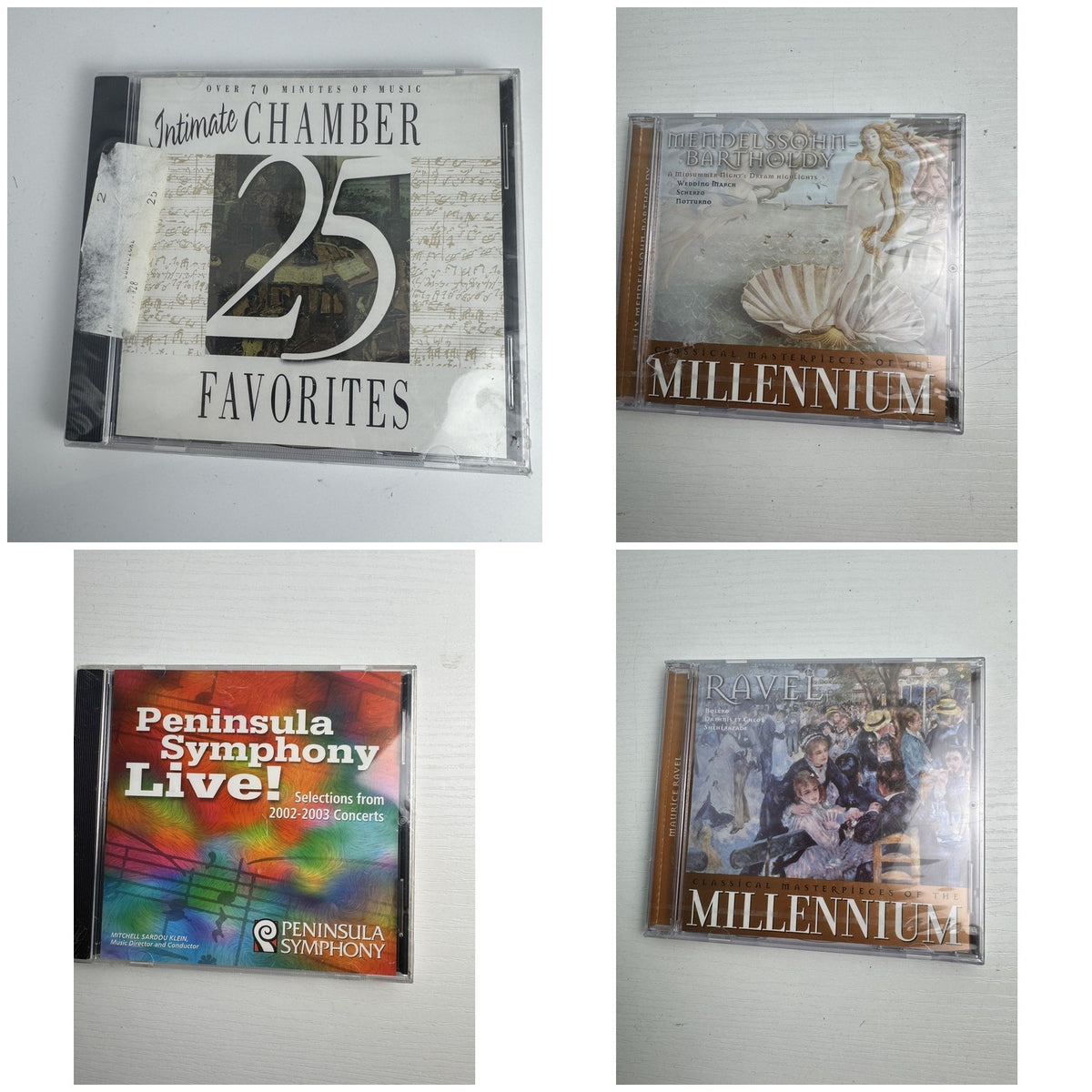 Set of four brand new factory sealed classical music CDs including works by Ravel, Mendelssohn, and Peninsula Symphony