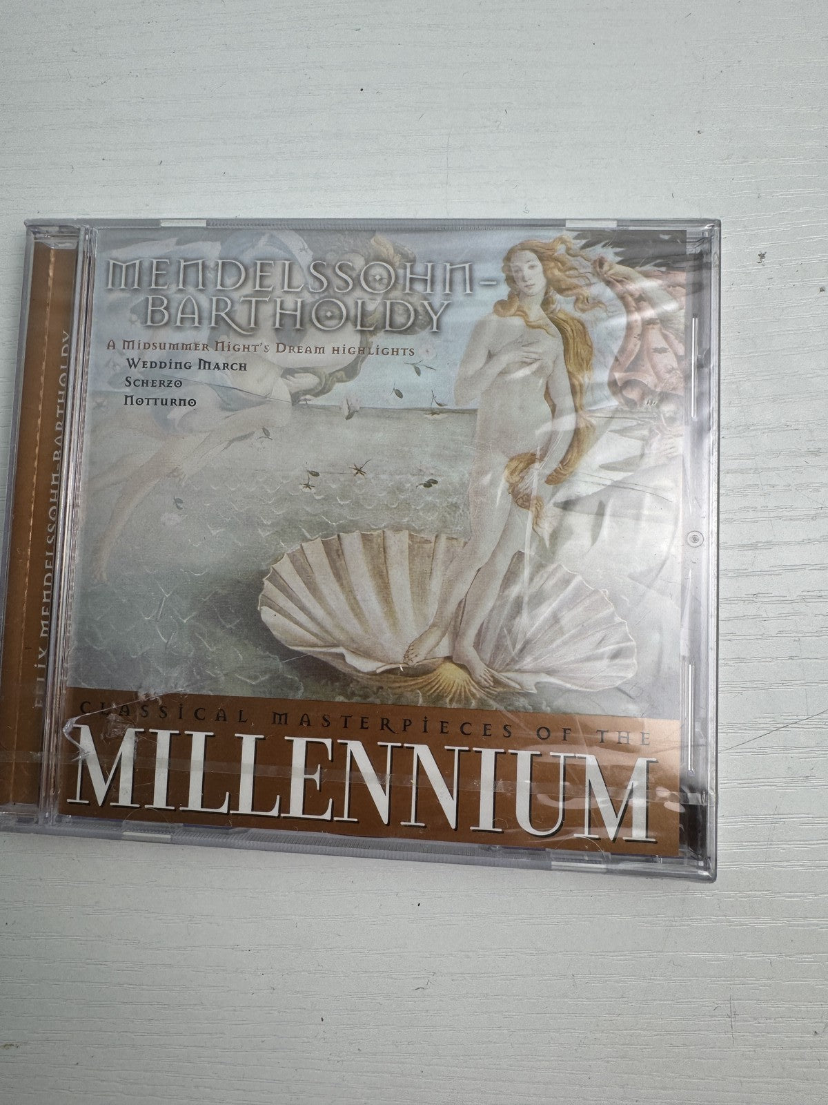 Set of four brand new factory sealed classical music CDs including works by Ravel, Mendelssohn, and Peninsula Symphony