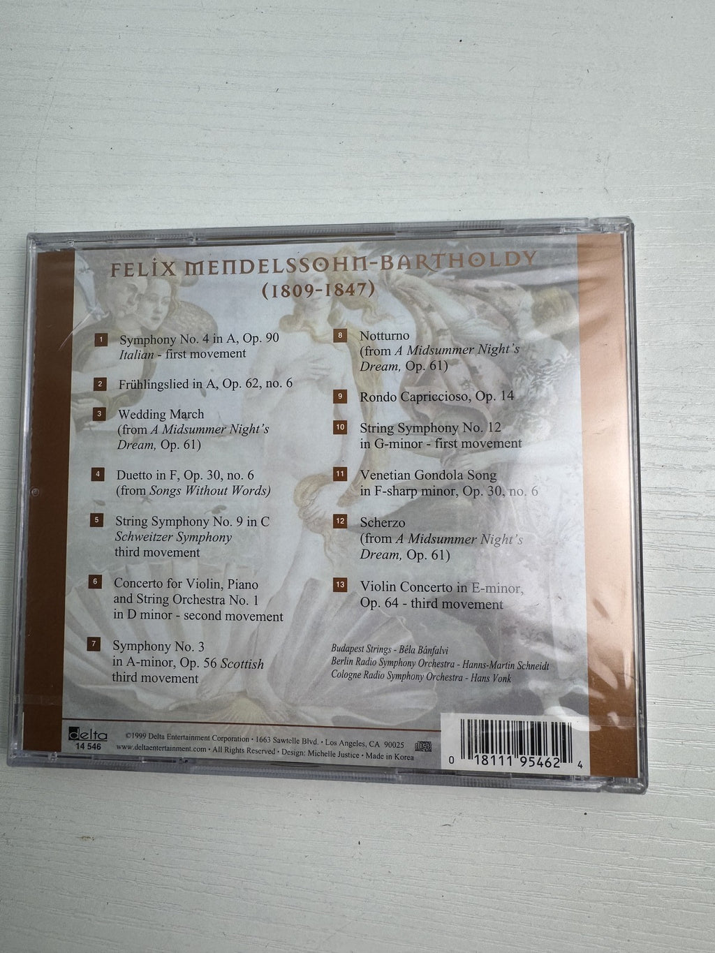 Set of four brand new factory sealed classical music CDs including works by Ravel, Mendelssohn, and Peninsula Symphony