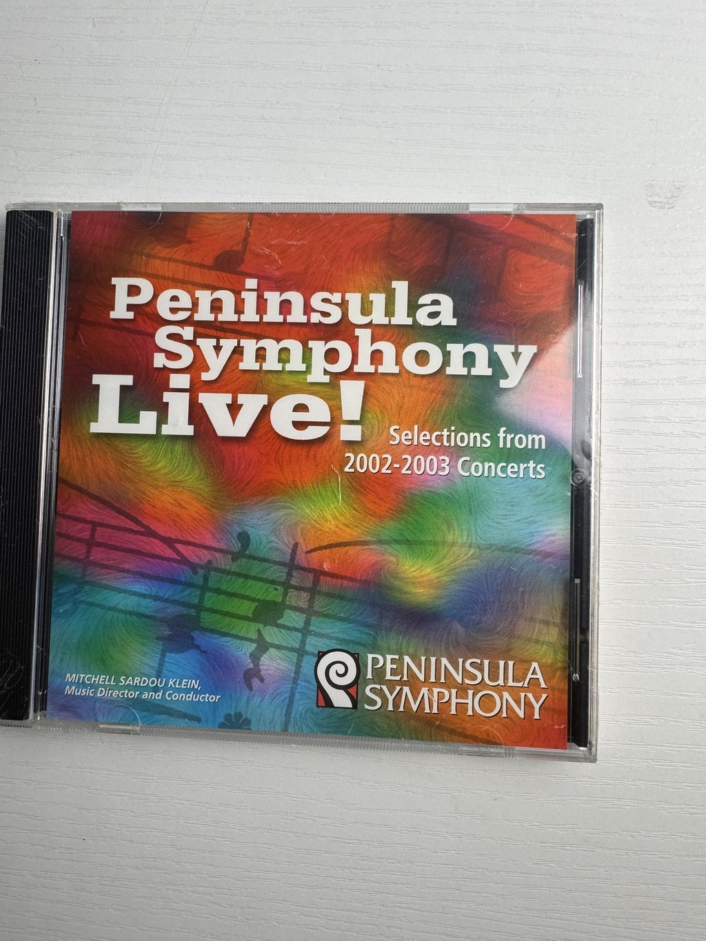 Set of four brand new factory sealed classical music CDs including works by Ravel, Mendelssohn, and Peninsula Symphony