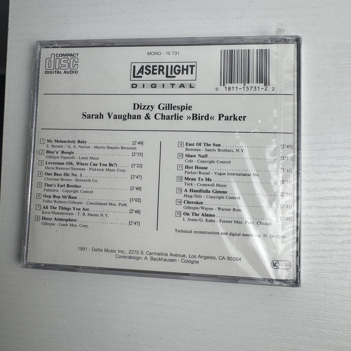 Factory-sealed lot of 4 classical and jazz music CDs including Dizzy Gillespie, Sarah Vaughan, and Strauss.