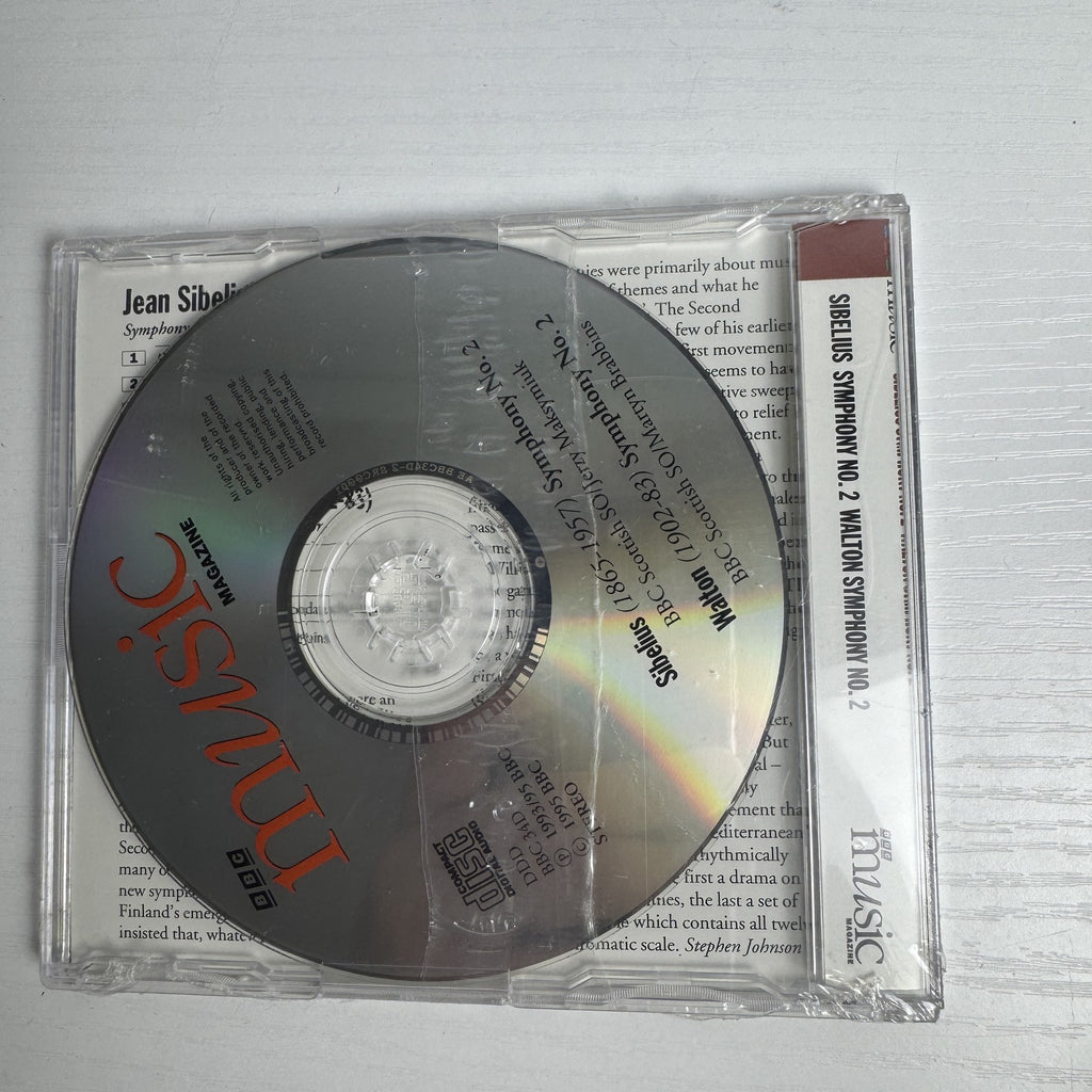 Factory-sealed lot of 4 classical and jazz music CDs including Dizzy Gillespie, Sarah Vaughan, and Strauss.