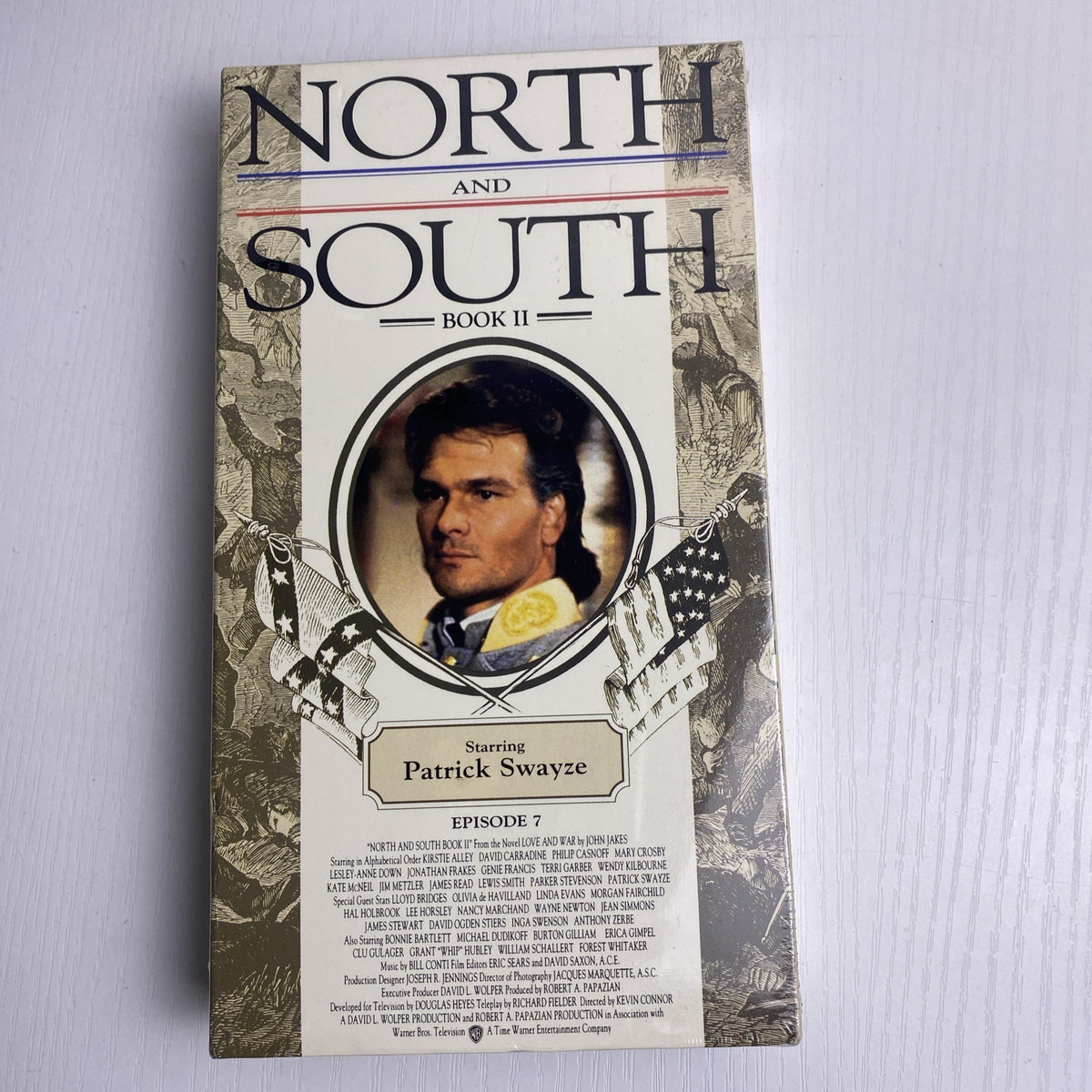 Four brand new factory sealed vintage VHS tapes featuring North and South with Patrick Swayze and Suzanne Deason yoga.