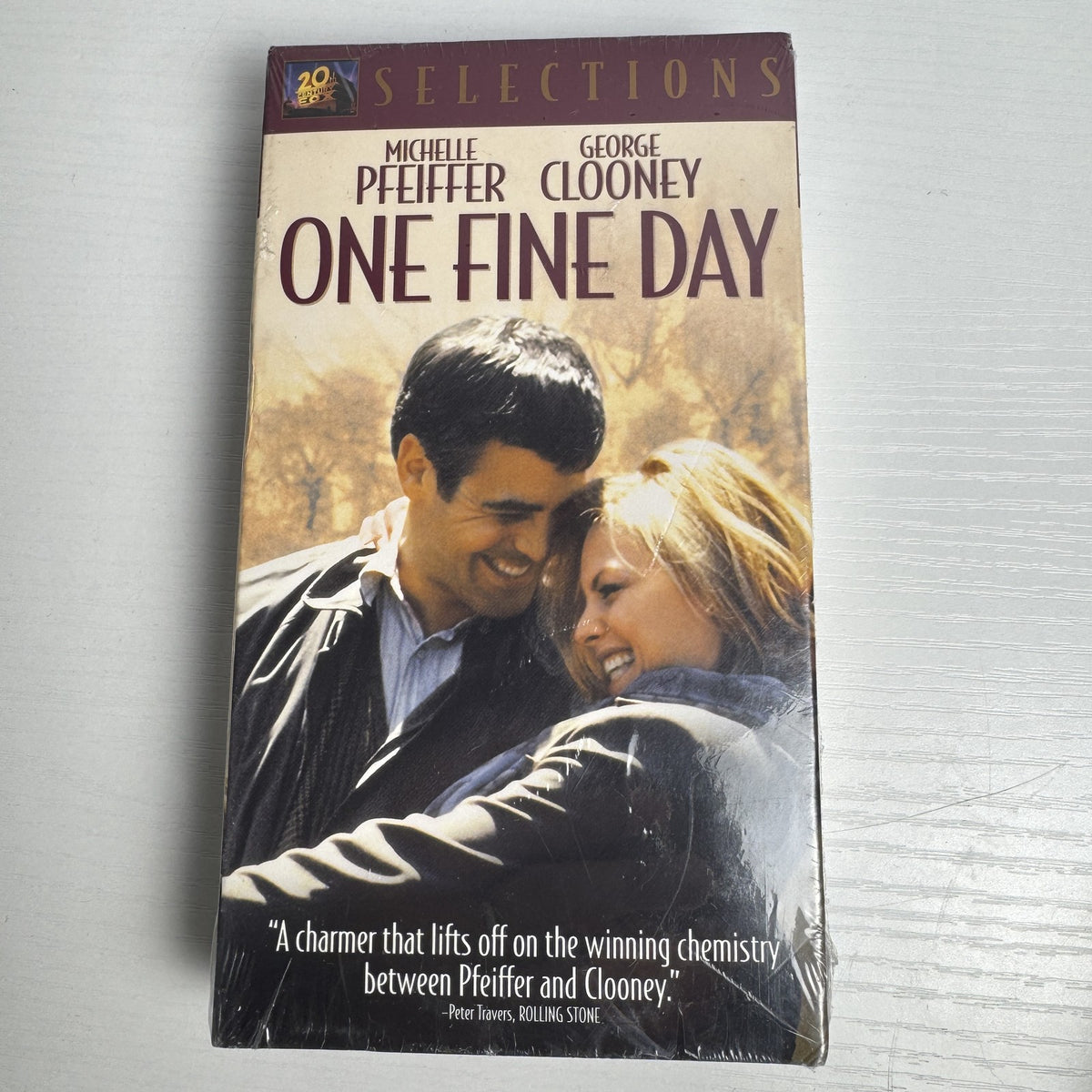 Set of four factory sealed retro VHS tapes featuring fitness workouts and the movie One Fine Day.