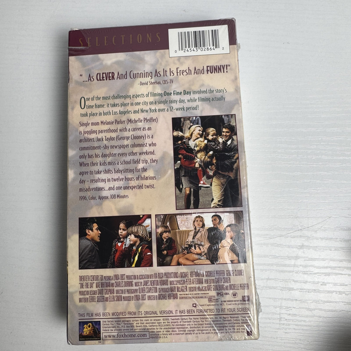 Set of four factory sealed retro VHS tapes featuring fitness workouts and the movie One Fine Day.