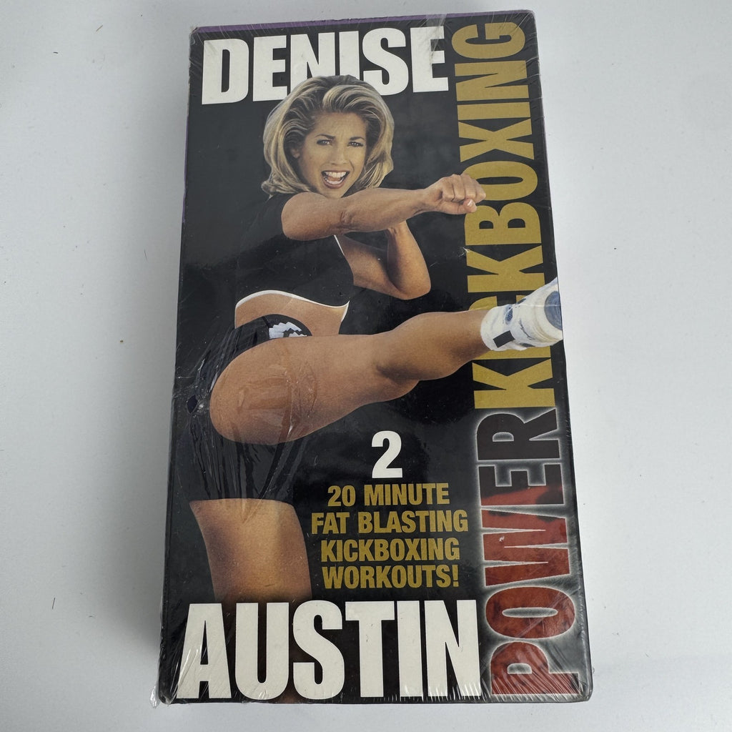 Set of four factory sealed retro VHS tapes featuring fitness workouts and the movie One Fine Day.