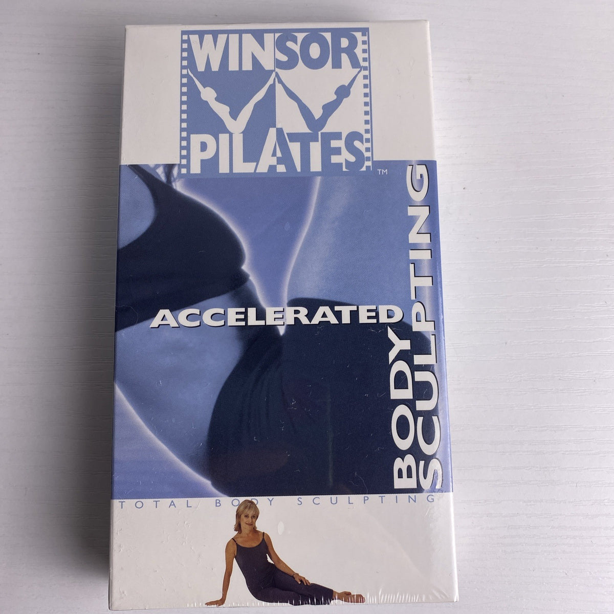 Set of 4 brand new factory sealed fitness workout VHS tapes including The Firm, Tony Little, Winsor Pilates, and Ab Ripper