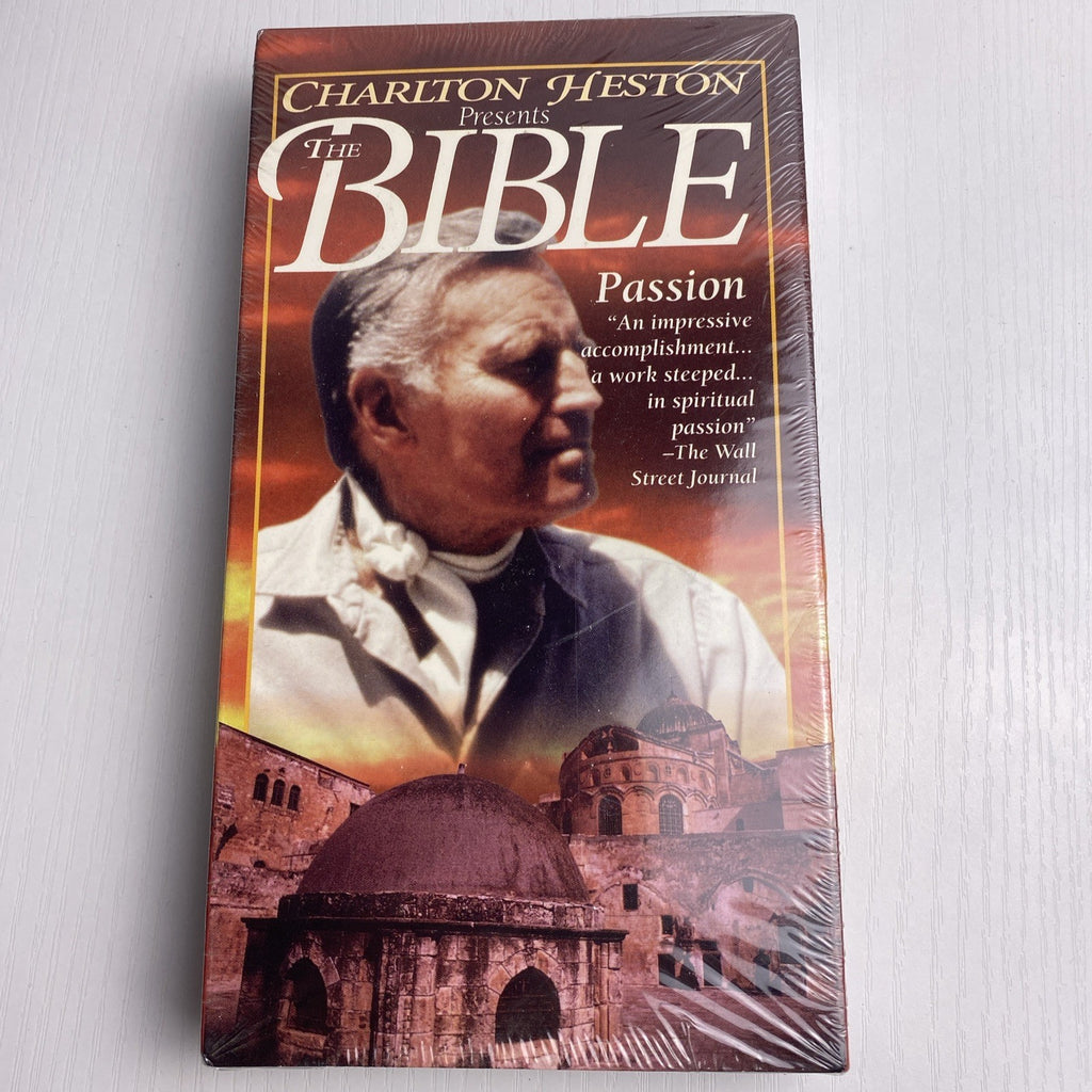 Factory sealed lot of 4 vintage VHS tapes including Charlton Heston Bible Passion and Rodney Yee Yoga