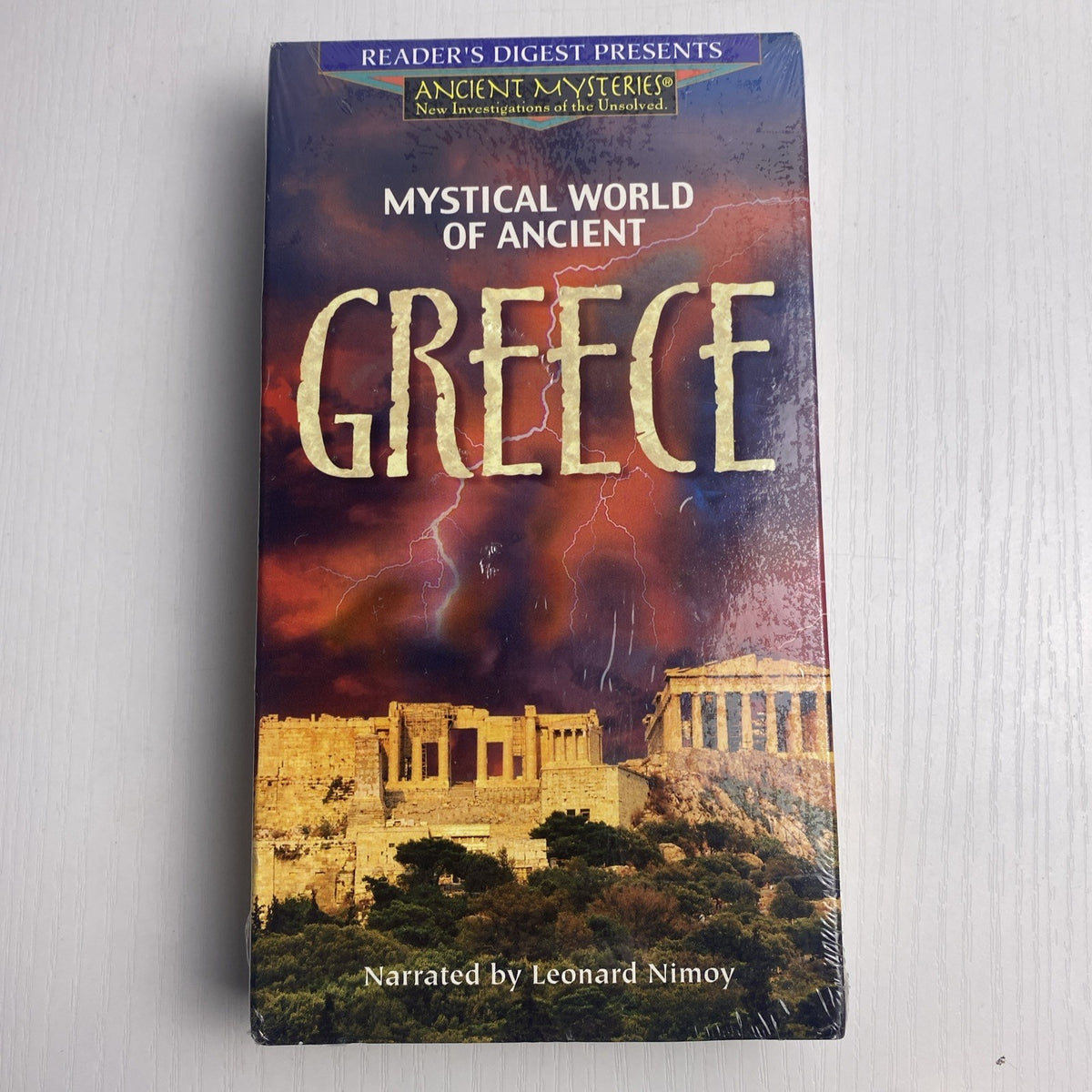 Lot of four brand new factory sealed history and travel documentary VHS tapes including Readers Digest and A&E titles.