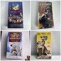 Lot of four brand-new factory-sealed vintage family VHS tapes including Alice in Wonderland and The Egg and I.