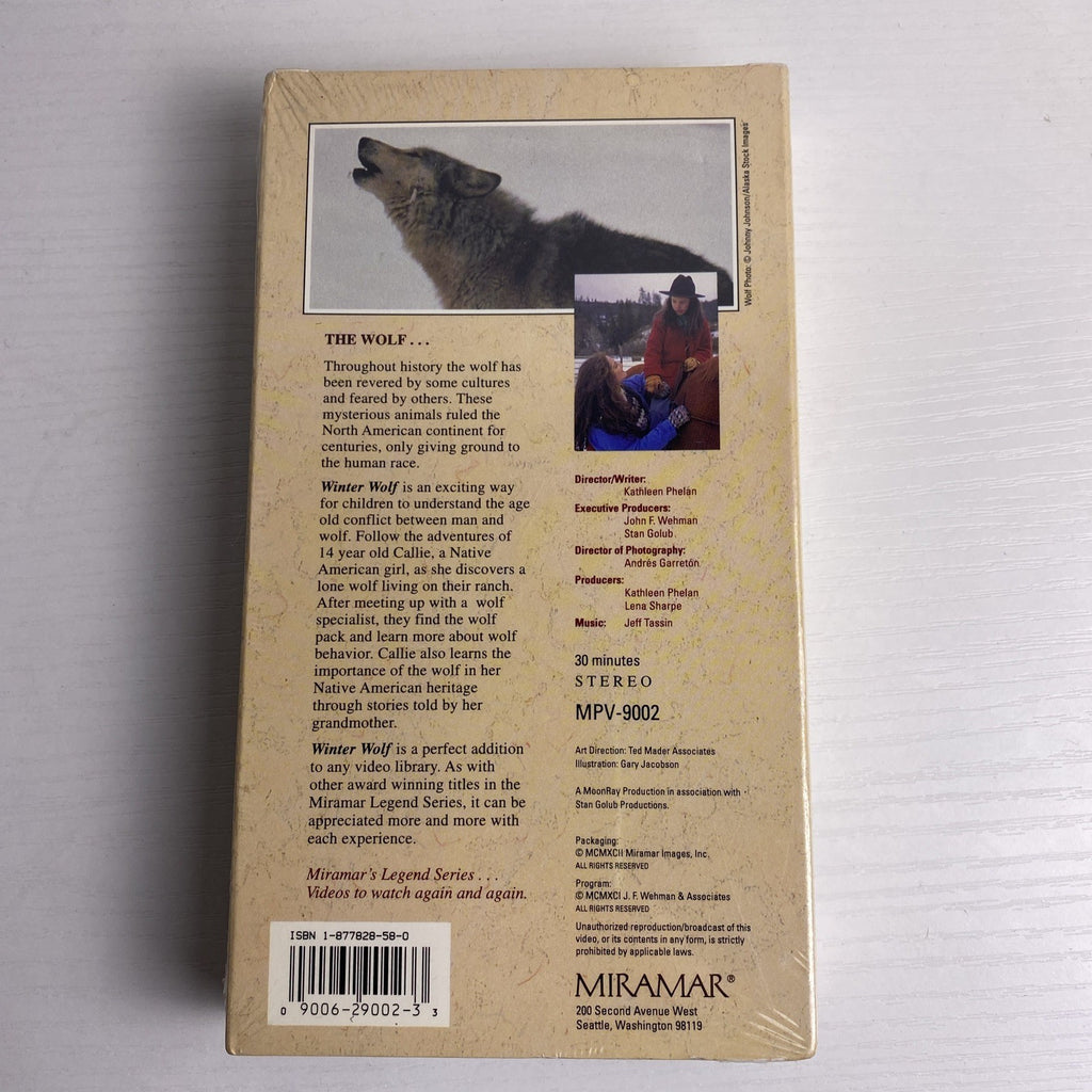 Lot of 4 factory-sealed family VHS movie tapes featuring Disney's Jungle Cat and 90s adventure White Wolves