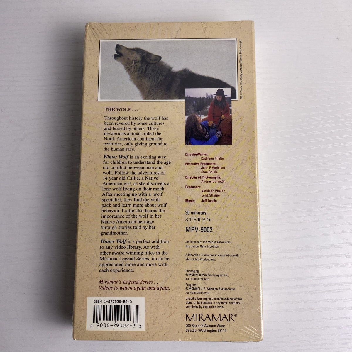 Lot of 4 factory-sealed family VHS movie tapes featuring Disney's Jungle Cat and 90s adventure White Wolves