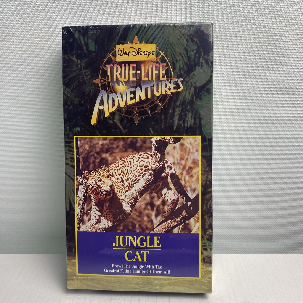 Lot of 4 factory-sealed family VHS movie tapes featuring Disney's Jungle Cat and 90s adventure White Wolves