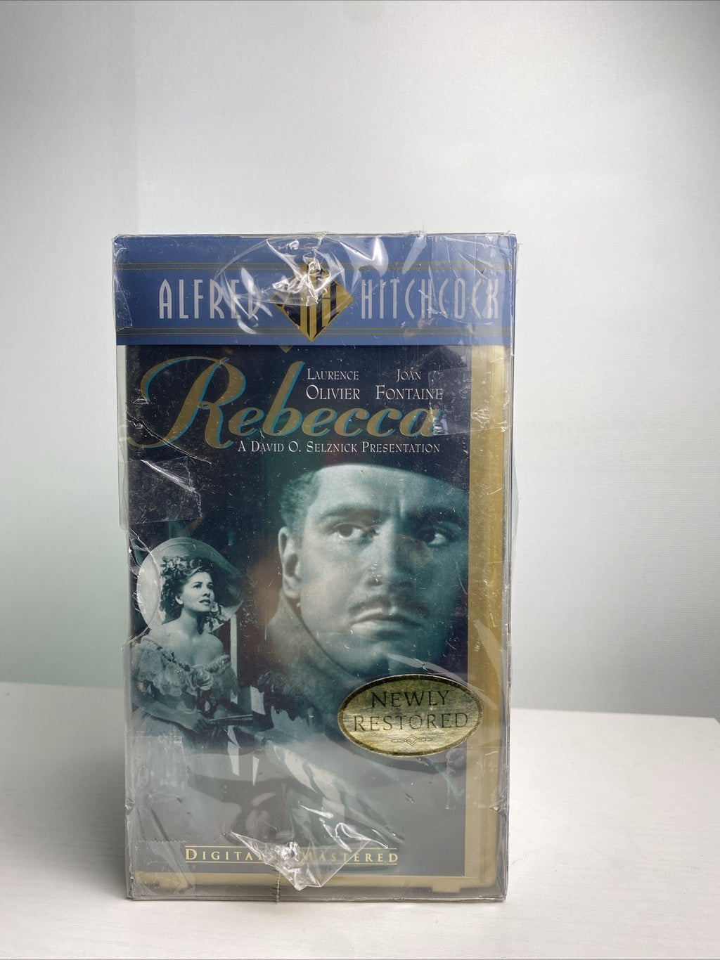 Lot of four brand new factory sealed VHS tape sets including Hitchcock Collection box set and Air Force One