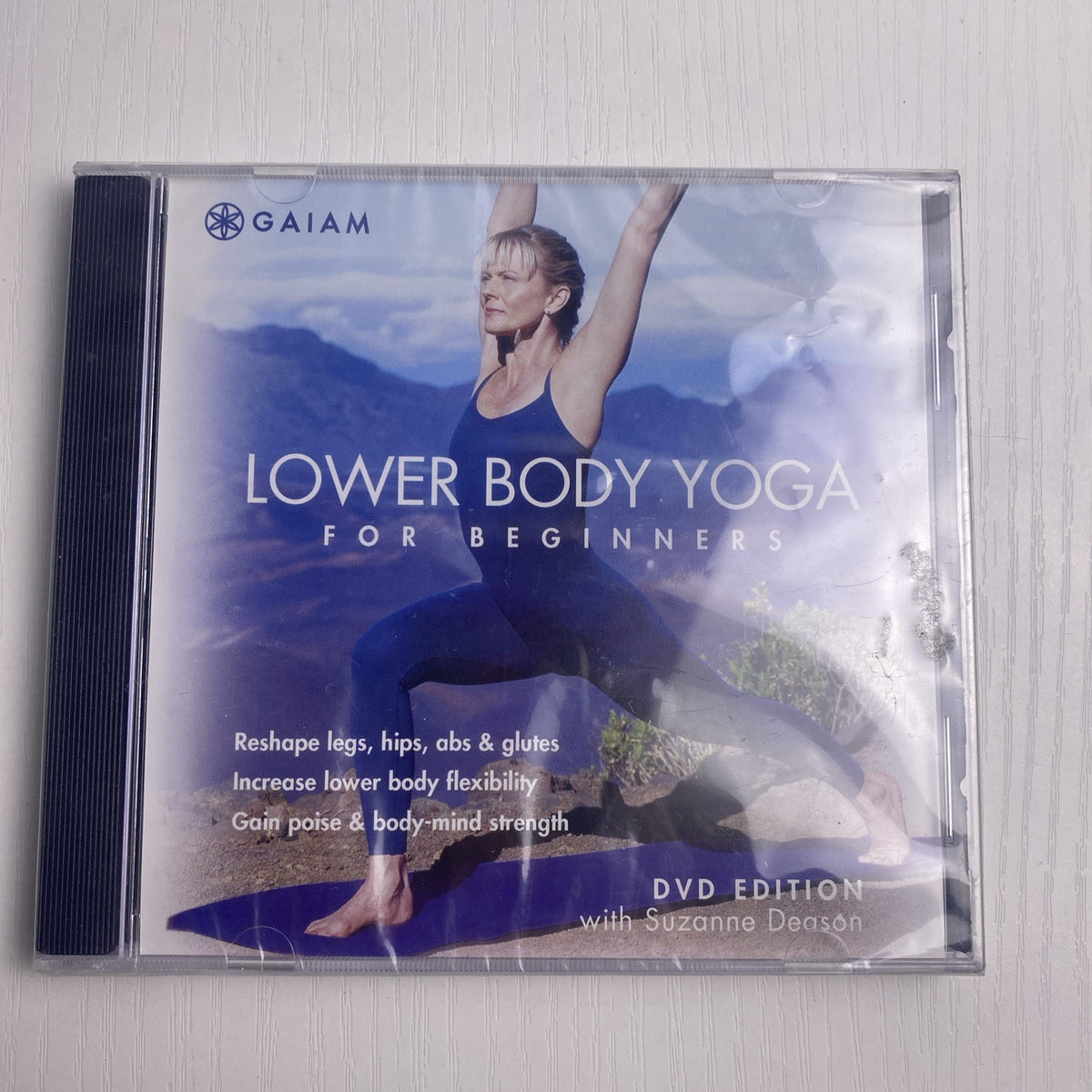 Set of 4 brand-new sealed DVDs including Ocean's Twelve, Syriana, Good Night and Good Luck, and Lower Body Yoga