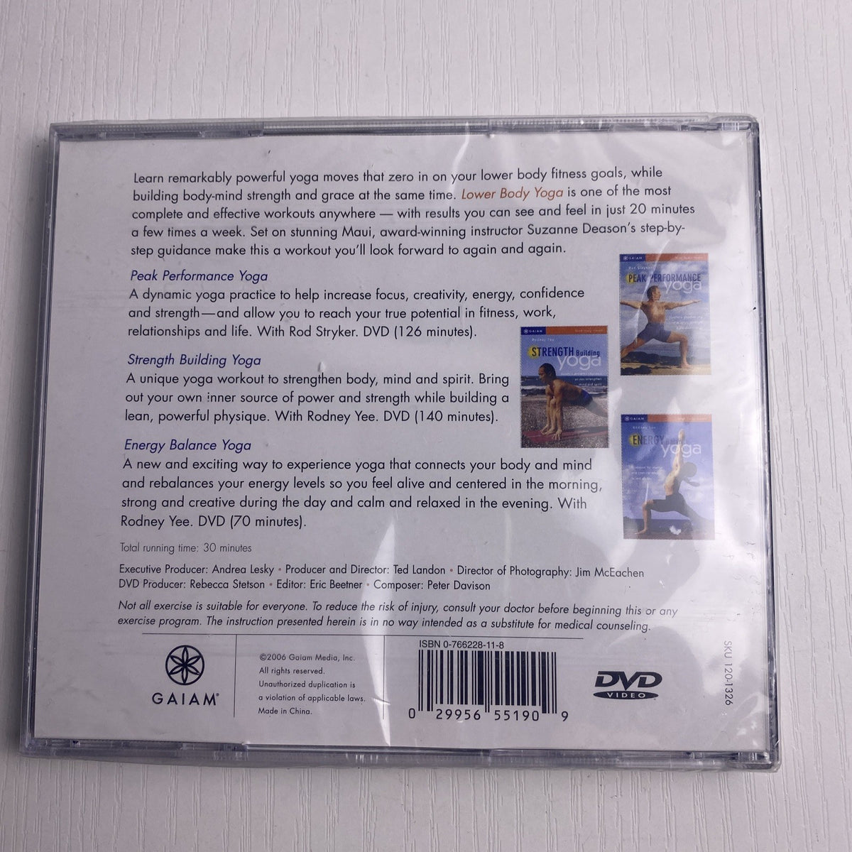 Set of 4 brand-new sealed DVDs including Ocean's Twelve, Syriana, Good Night and Good Luck, and Lower Body Yoga