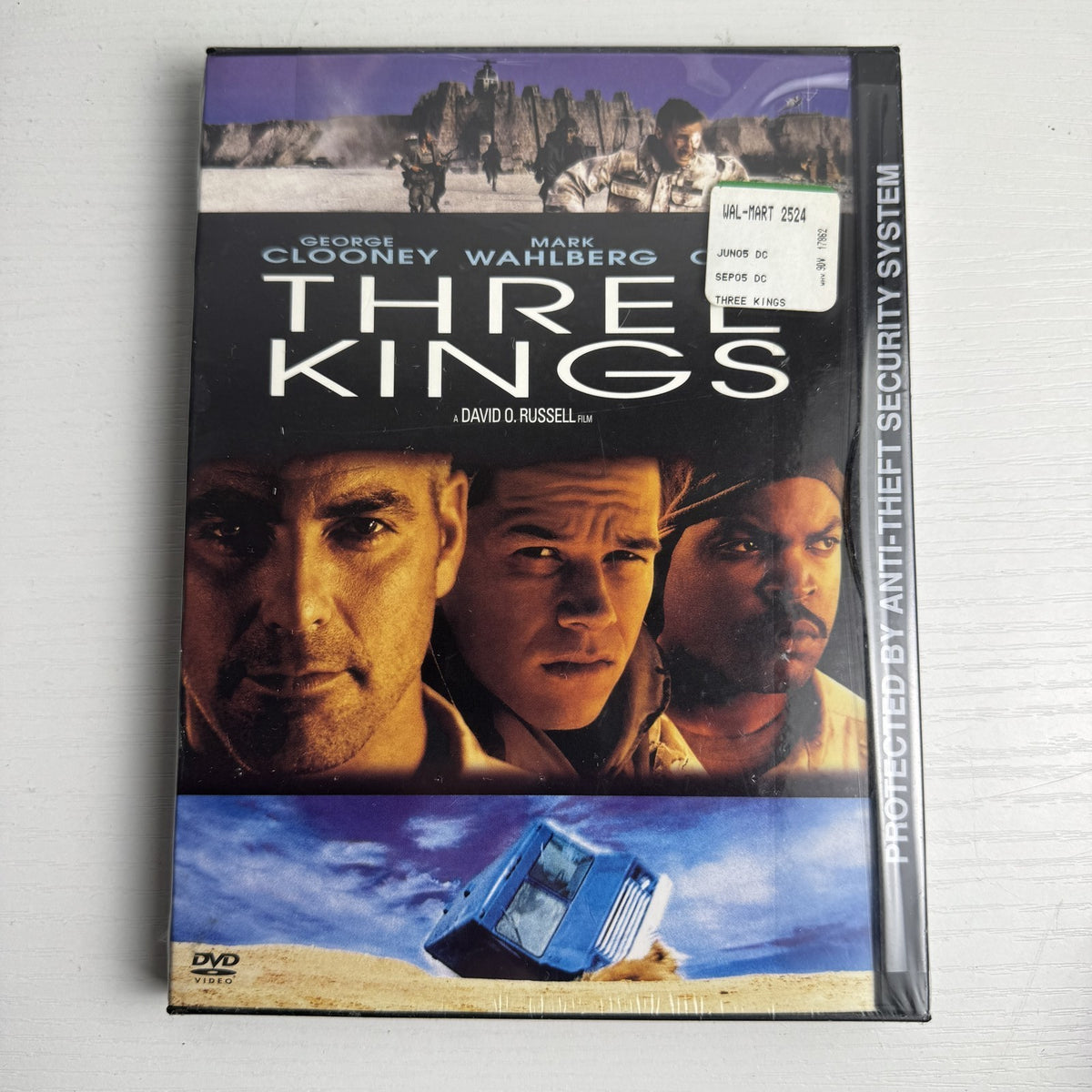 Four brand new factory-sealed DVDs including Three Kings movie and Beachbody P90X fitness workouts.