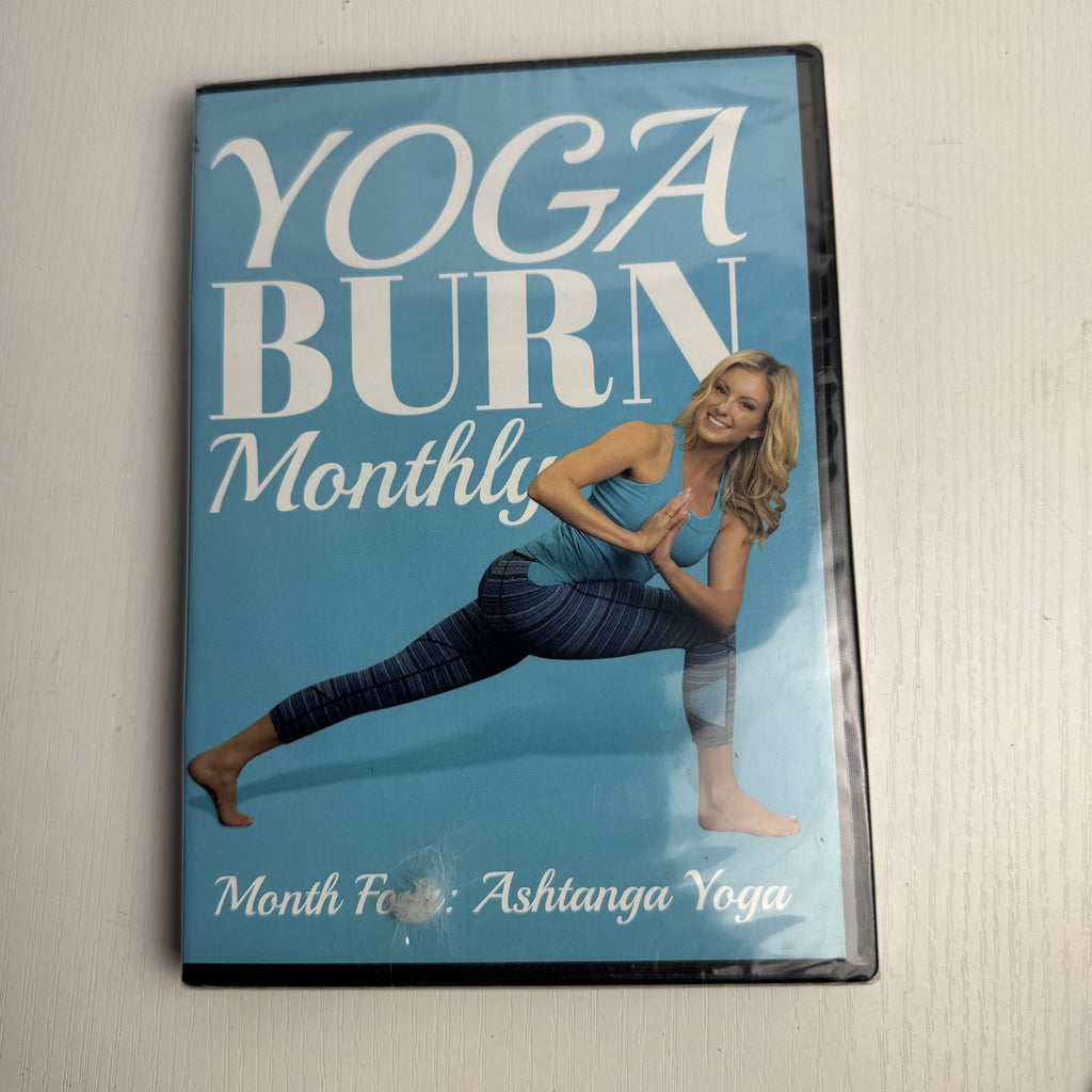 Set of four factory-sealed Yoga Burn Monthly and NOOMA Breathe home fitness DVDs
