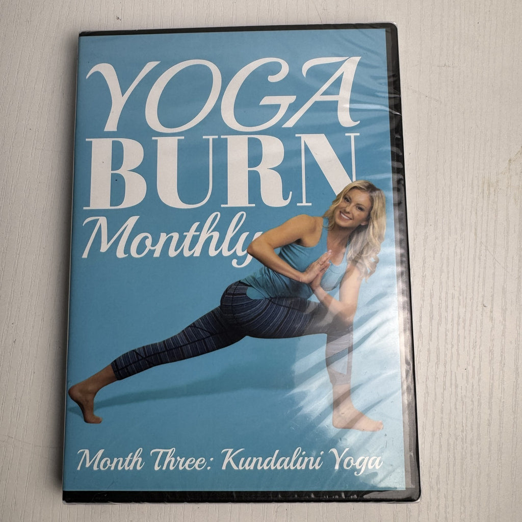 Set of four factory-sealed Yoga Burn Monthly and NOOMA Breathe home fitness DVDs
