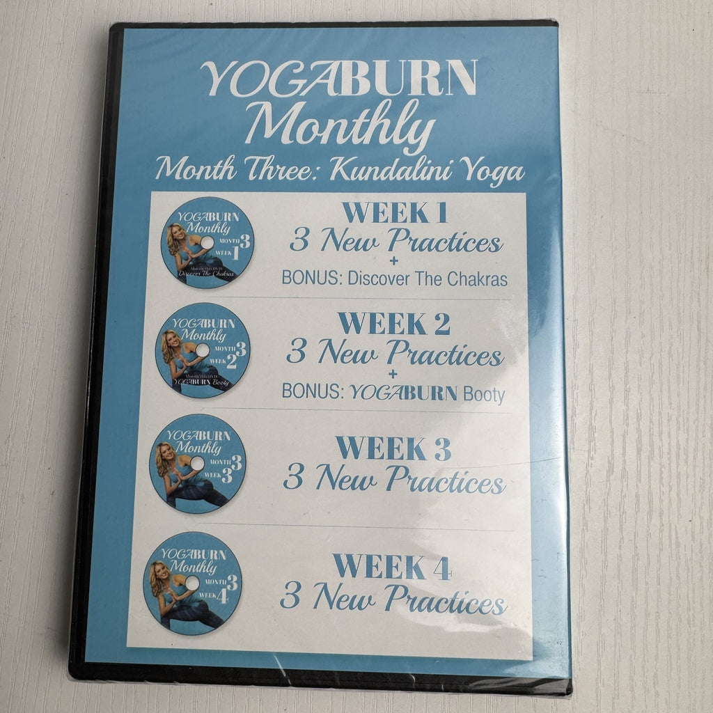 Set of four factory-sealed Yoga Burn Monthly and NOOMA Breathe home fitness DVDs